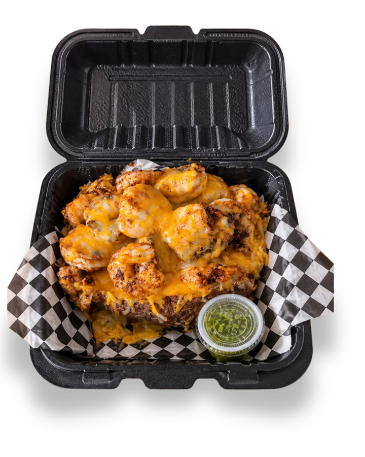ShrimpFlo loaded baked potato topped with seasoned shrimp and melted cheese, ready for pickup